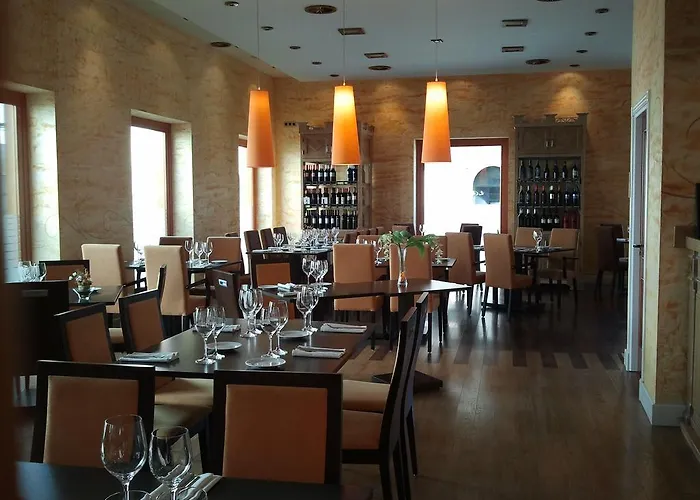 Отель Capitolina